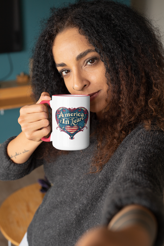 Smiling woman holding 'America In Heart' patriotic mug in cozy indoor setting