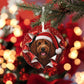 Goldendoodle Christmas ornament with red bokeh lights